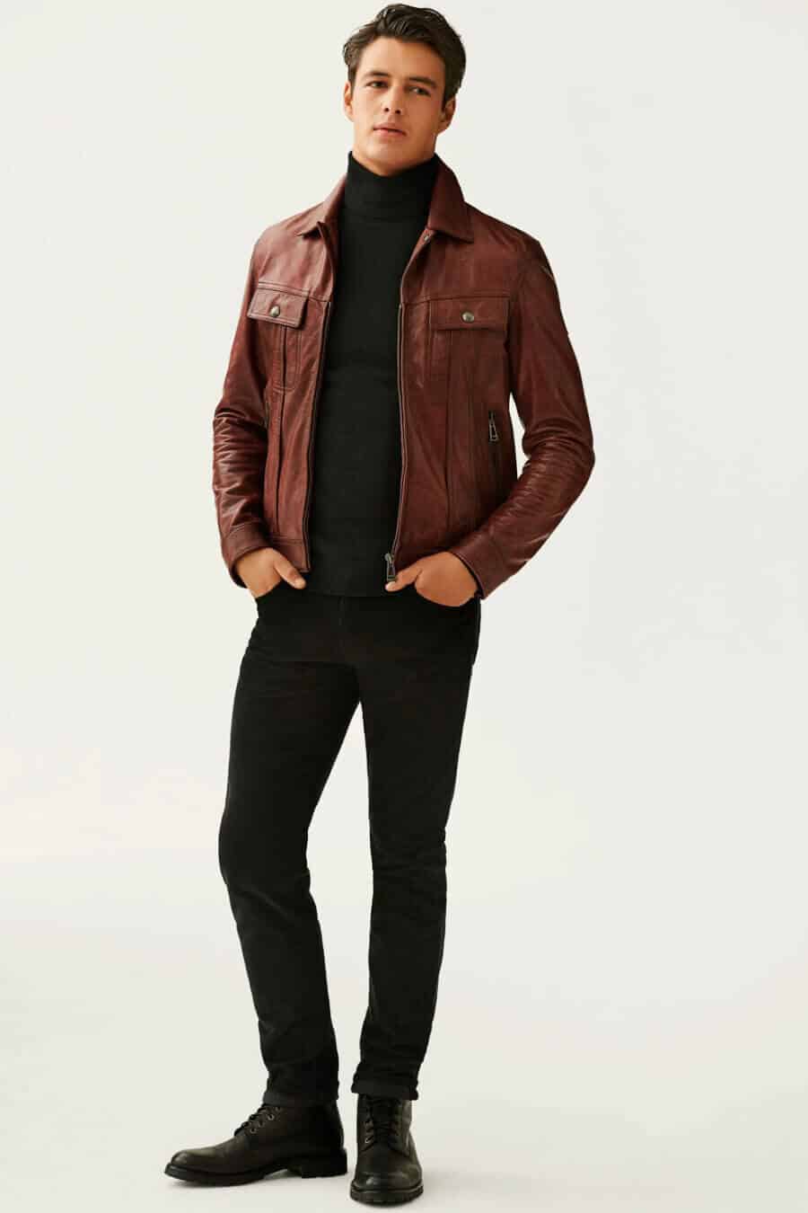 Men's brown leather jacket, black roll neck, jeans and boots outfit 