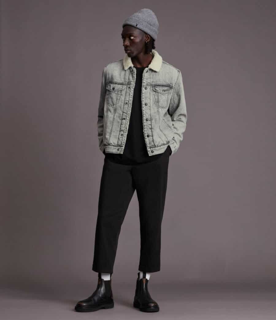 Edgy sherpa jean jacket outfit for men with cropped chinos and boots