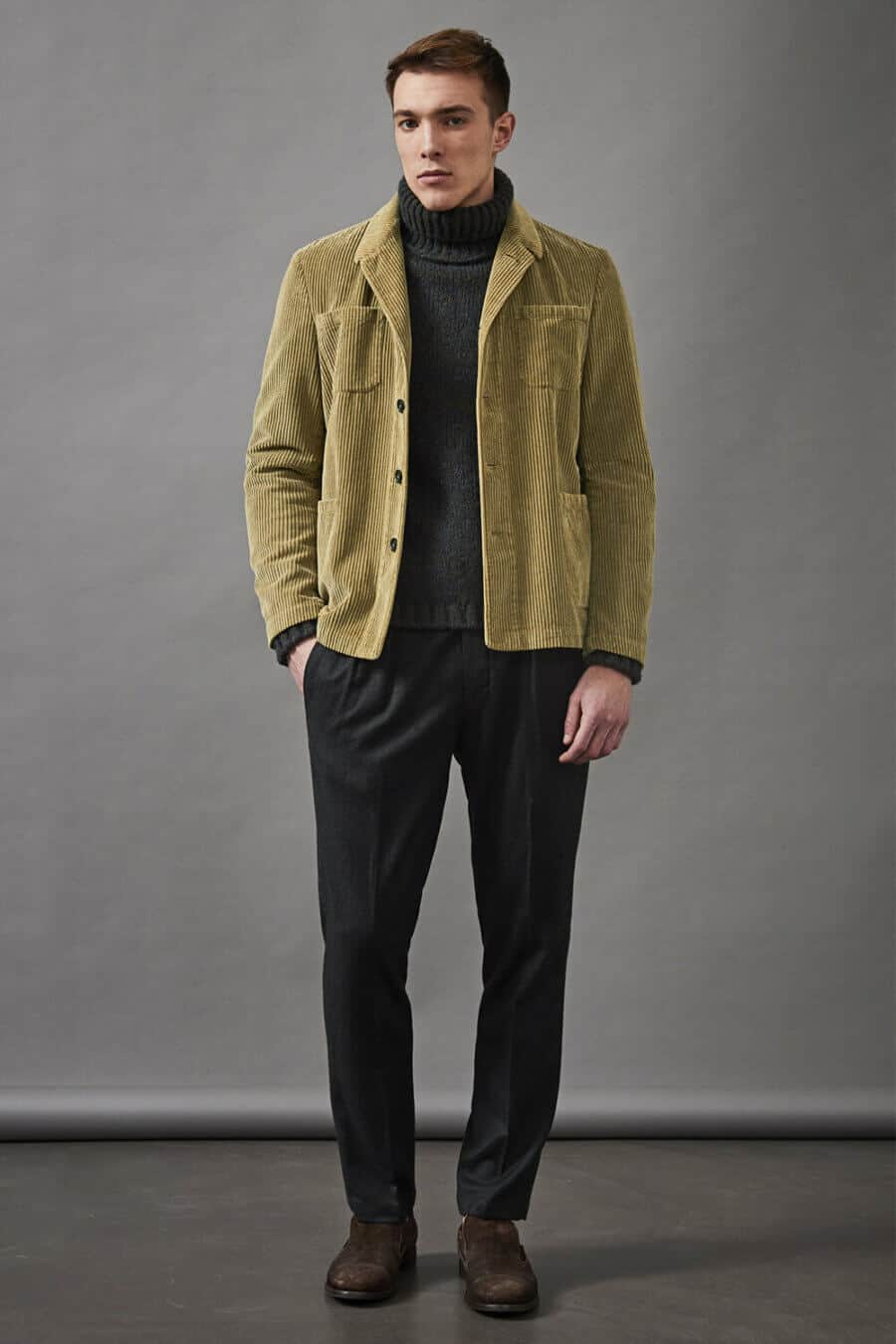 Men's turtleneck outfit with a chore coat, jeans and boots