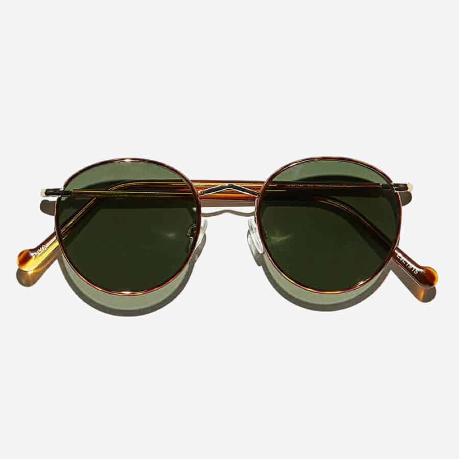 Cool Round Sunglasses For Men: Moscot Zev tortoiseshell frame with green gradient lenses