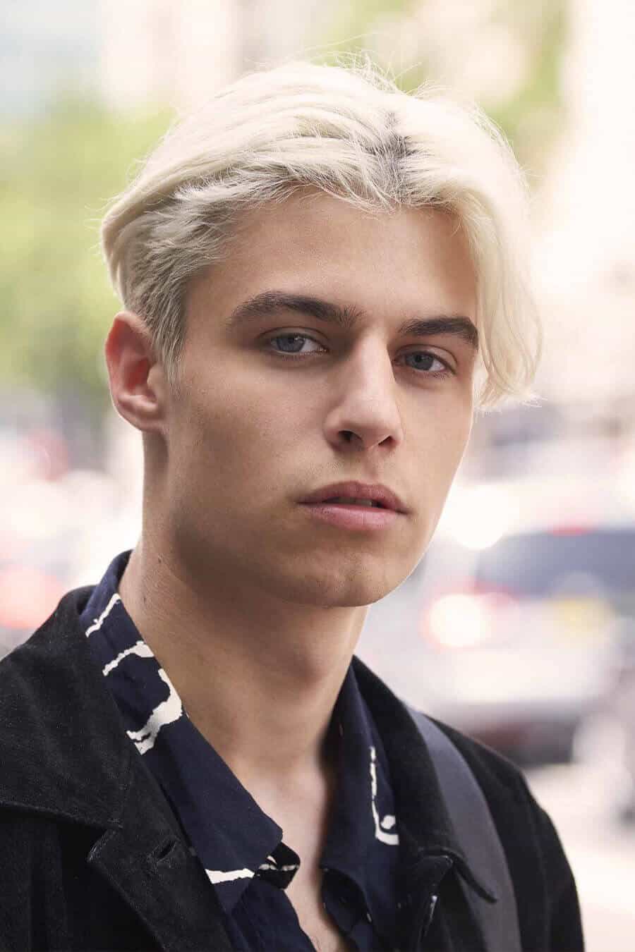 Bleached blonde curtains hairstyle for men