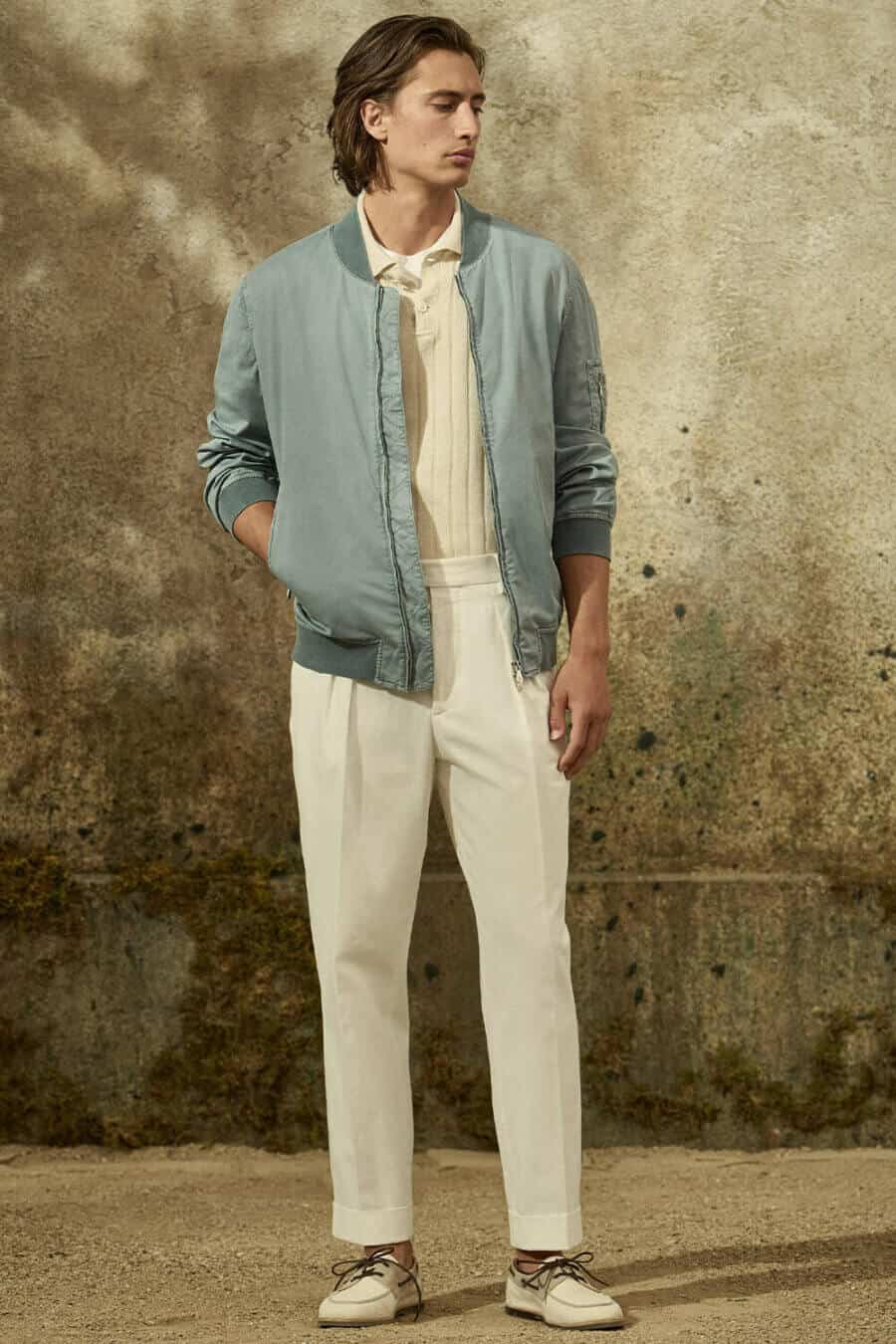Dress Italian - Men's white pleated trousers with knitted polo shirt and bomber jacket