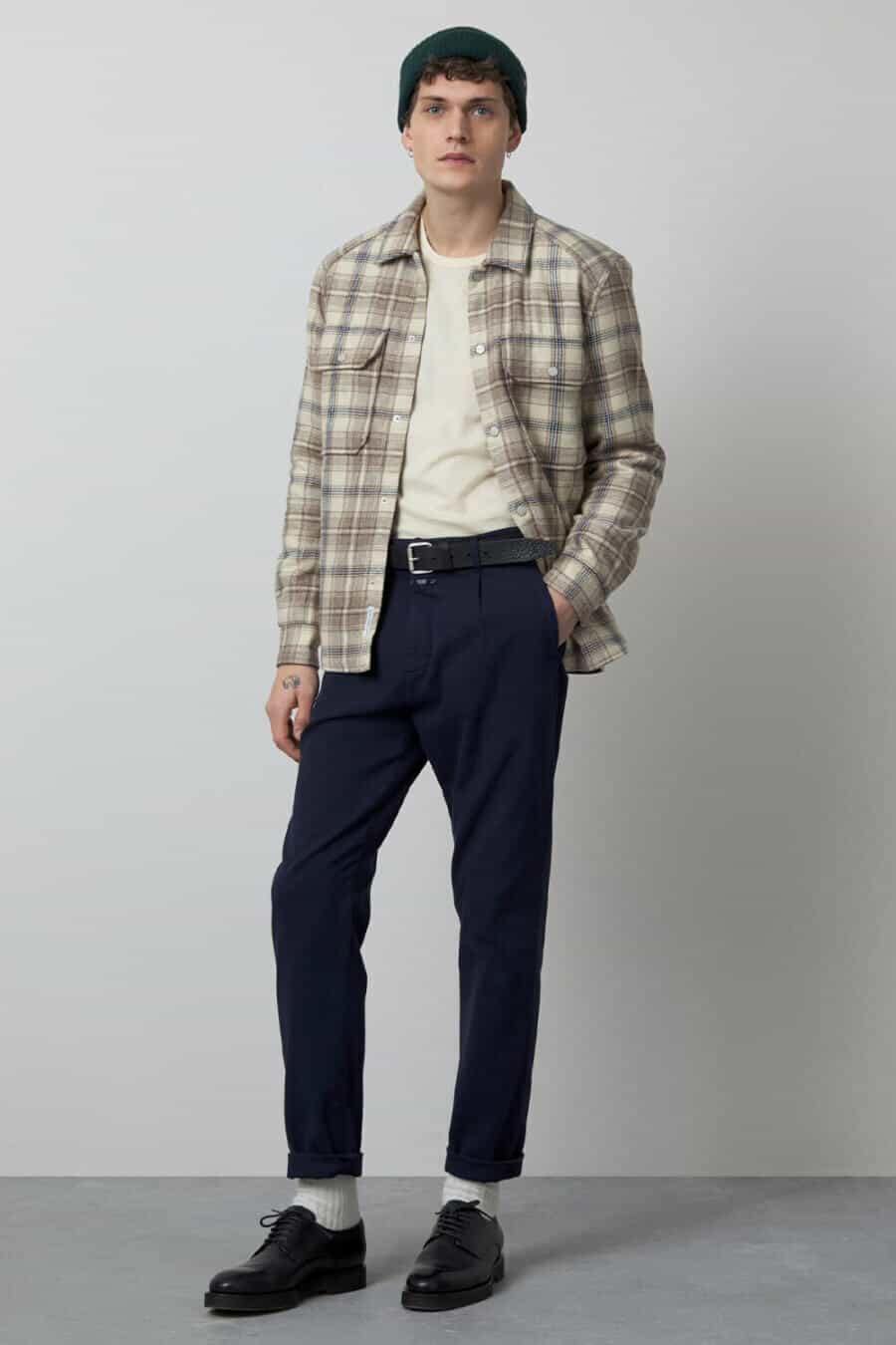 Men's punk flannel shirt outfit with jeans and chunky shoes