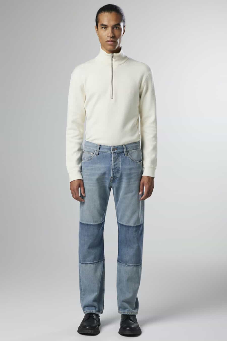 Men's workwear jeans, white funnel neck sweater and black shoes outfit