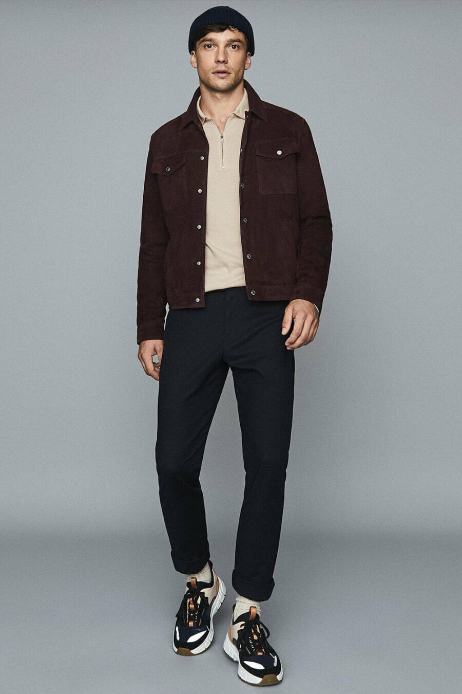 Men's zip neck polo shirt with suede trucker jacket and chinos