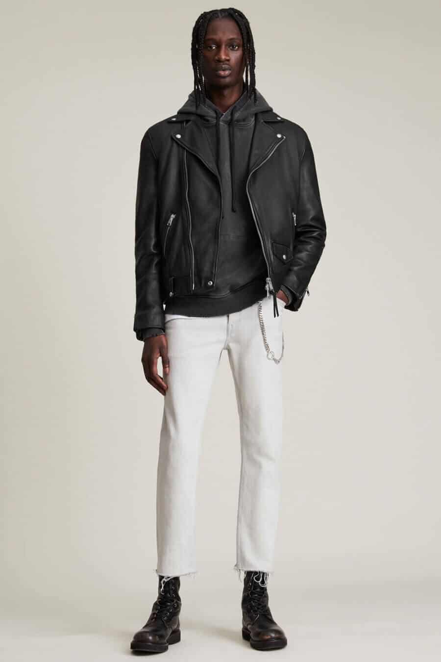 Men's white jeans with black leather jacket outfit