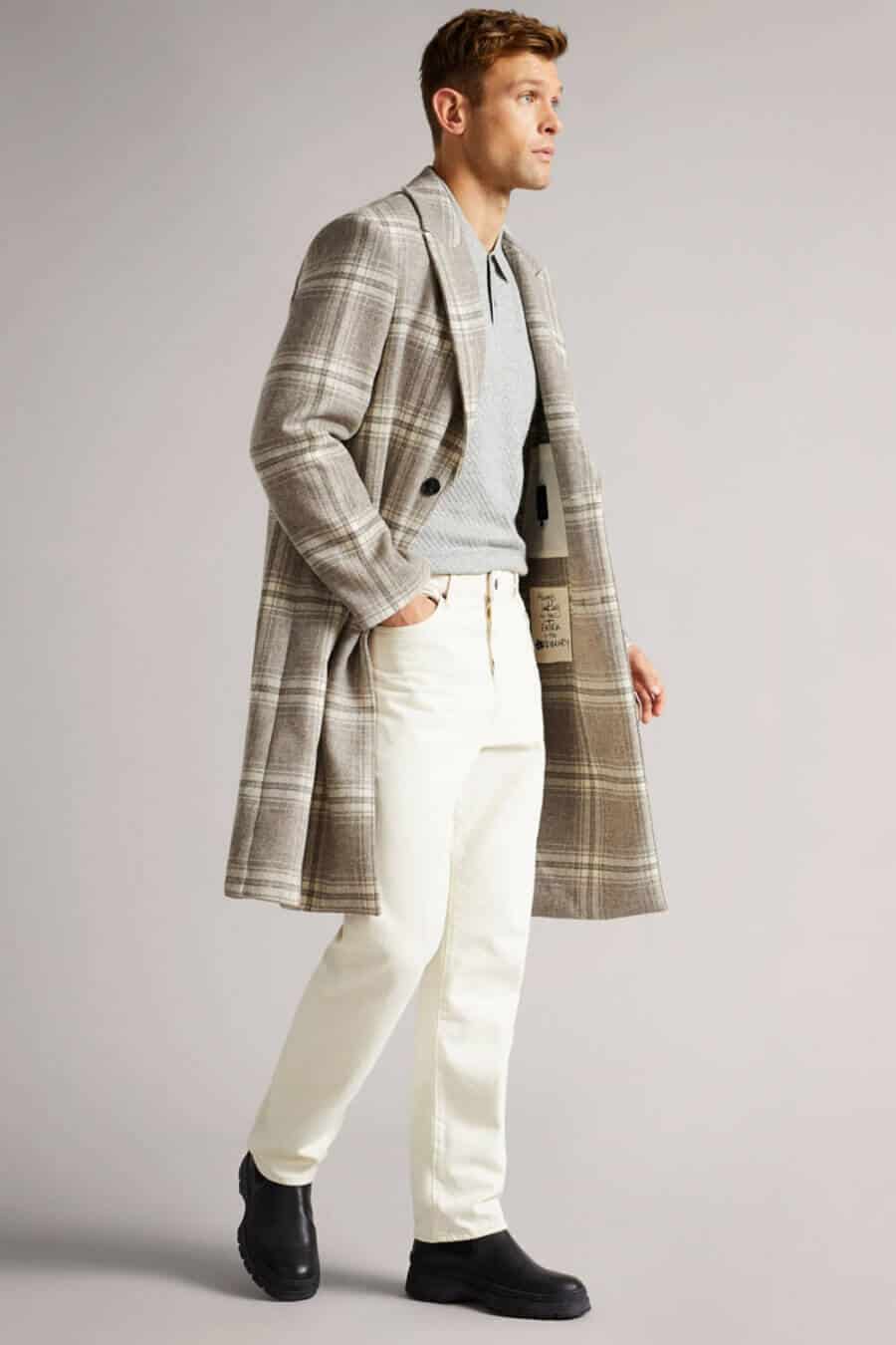 Men's white jeans and checked overcoat outfit