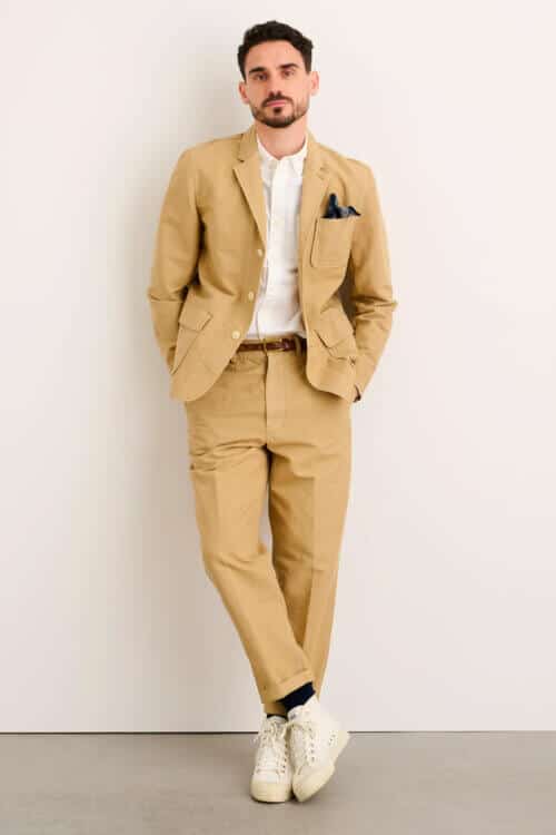 Men's workwear suit with white shirt and canvas sneakers