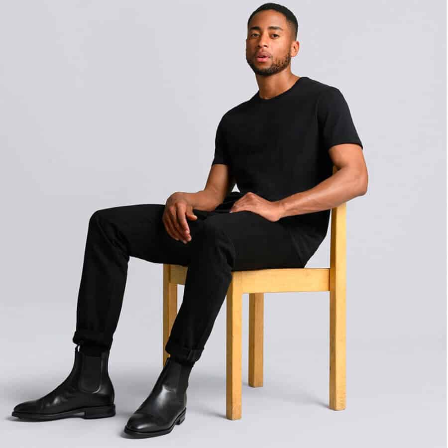 Men's all black outfit with black jeans, Chelsea boots and T-shirt