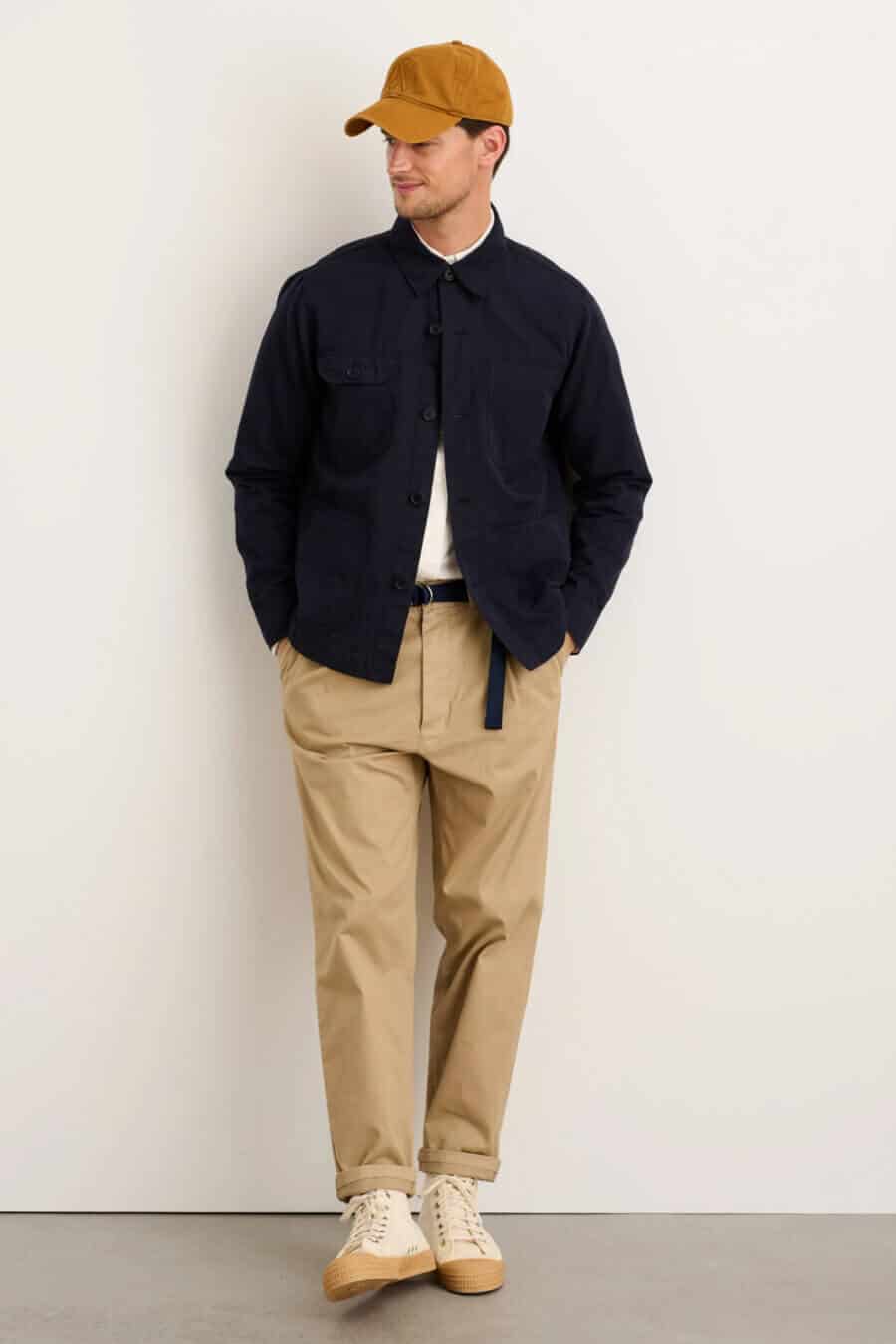 Men's linen worker jacket with relaxed chinos and sneakers outfit