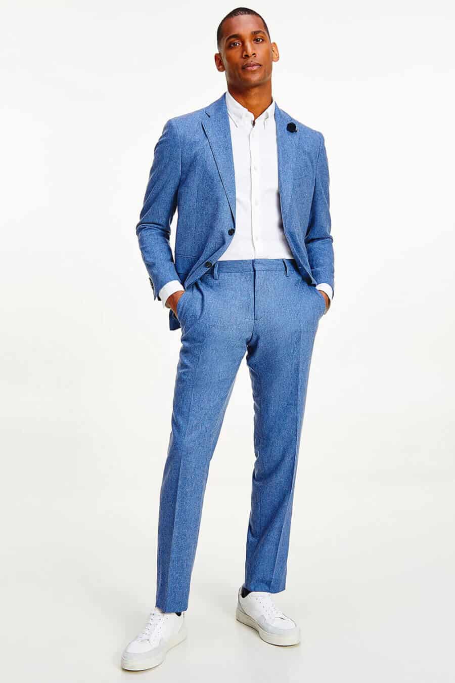Men's bright blue suit with white shirt and white sneakers outfit