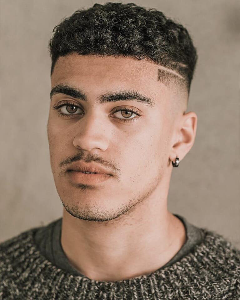Men's Neat afro with high skin fade