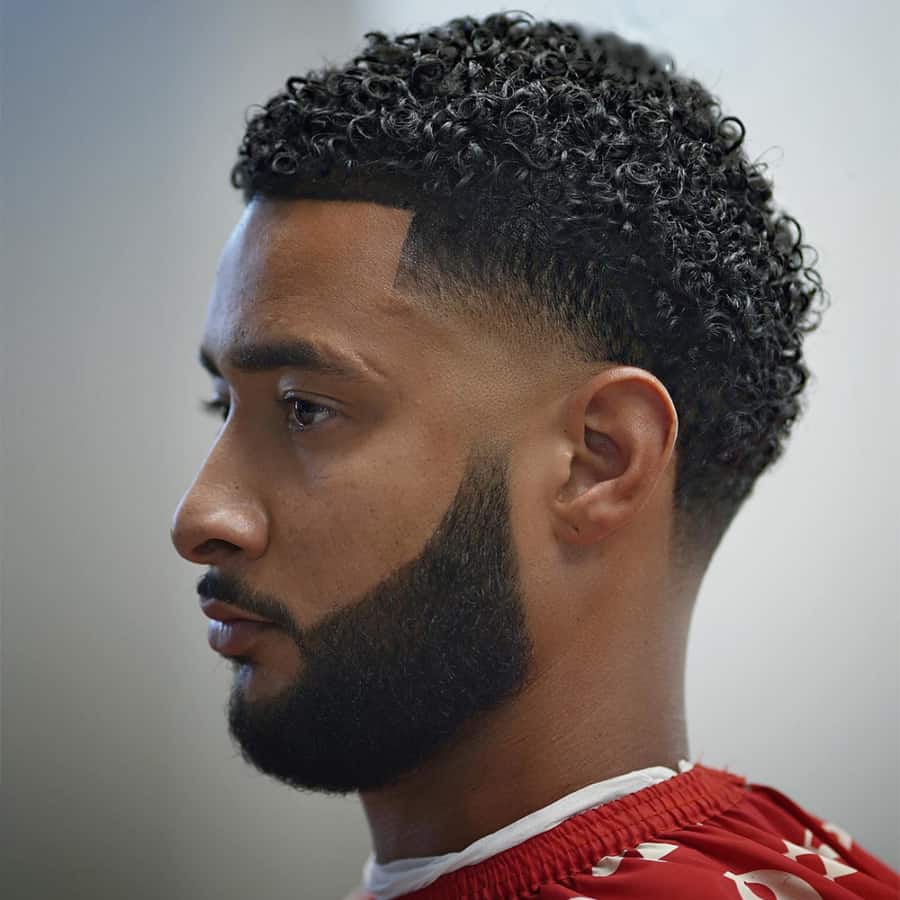 Men's Slick curly hair with fade