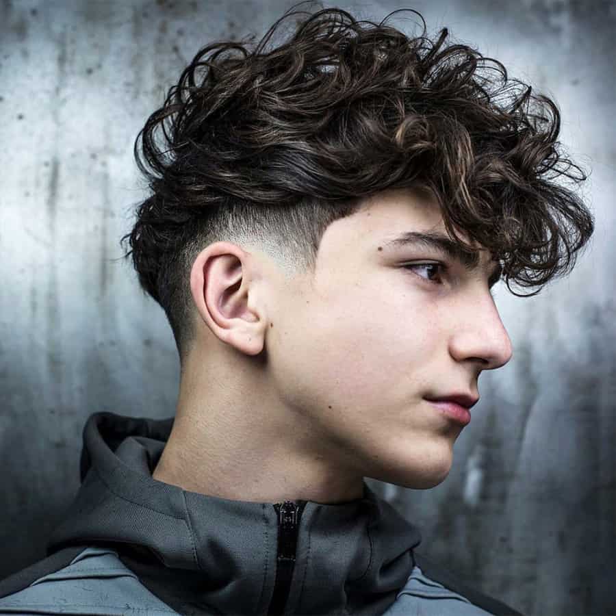 Long curly hair with low fade