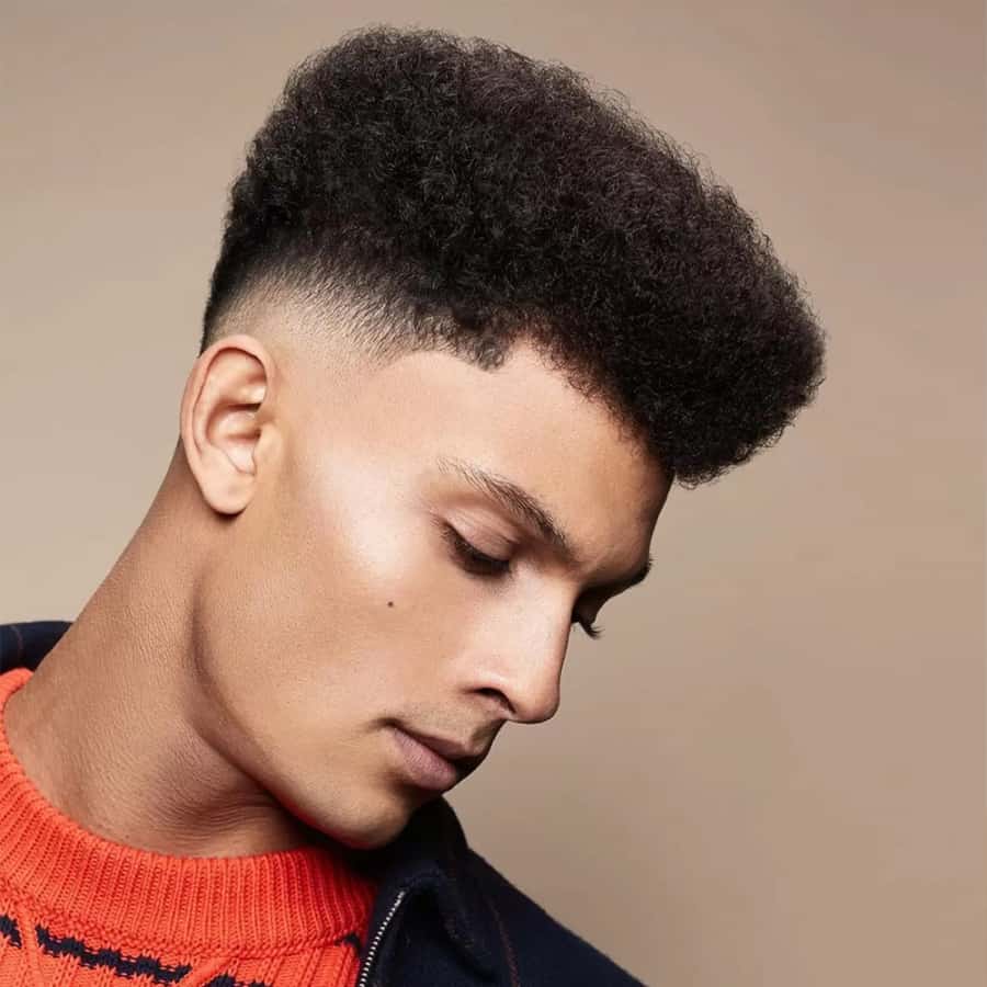 Men's curly high top with skin fade