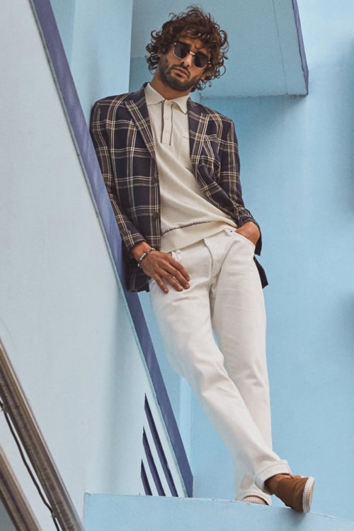 Men's checked sports coat, white chinos and knitted polo shirt outfit