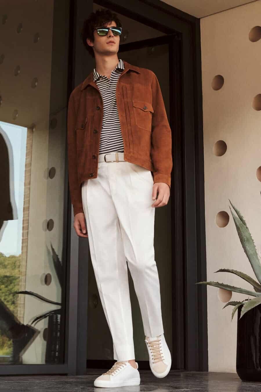 Men's suede jacket summer outfit with white trousers and sneakers
