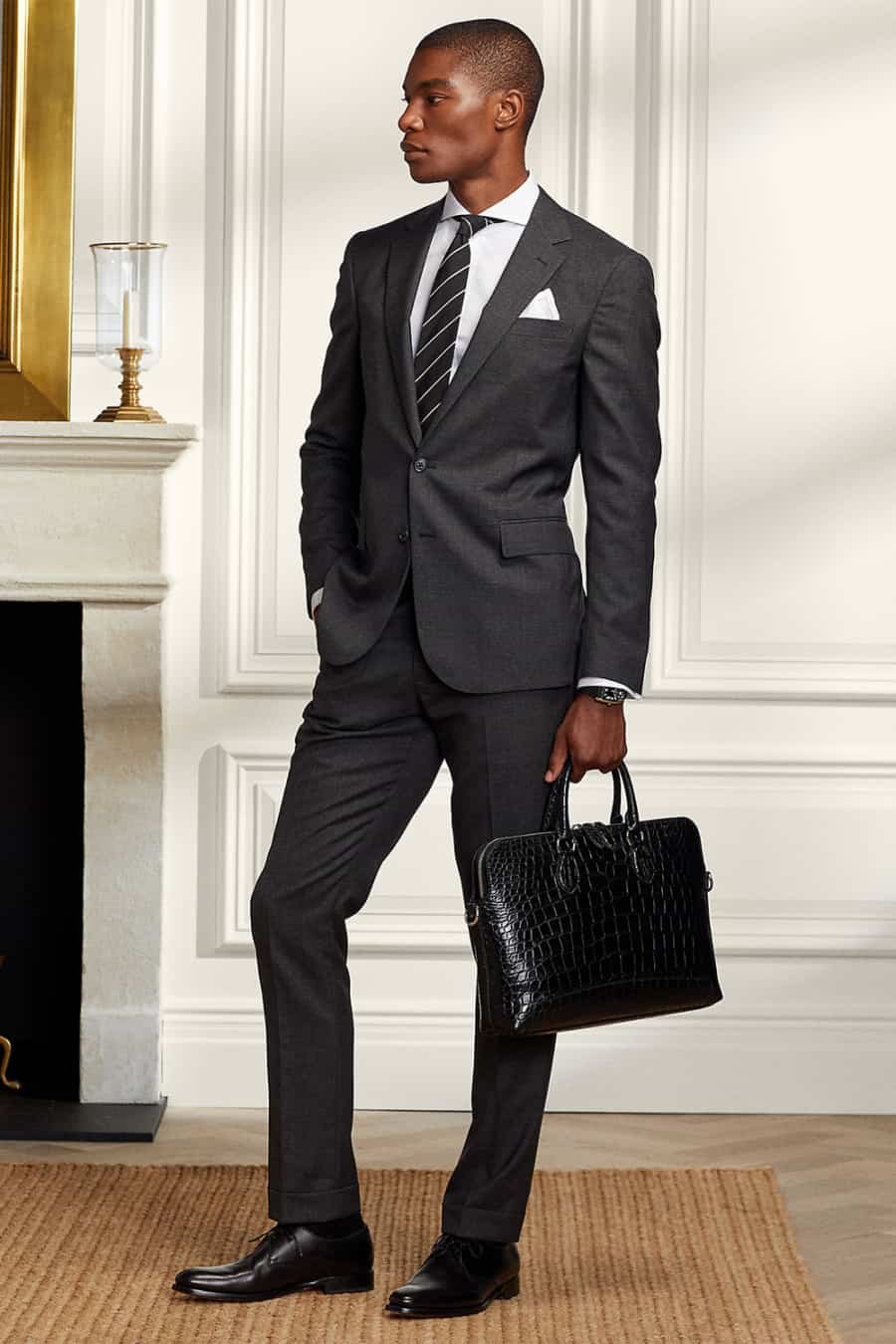 Men's charcoal suit with black Oxford shoes
