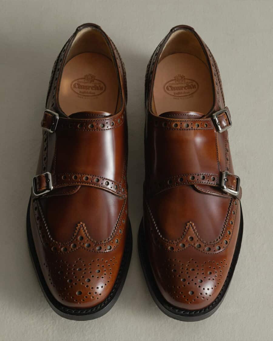 Men's luxury brown leather double monk-strap shoes by Church's with brogueing detail