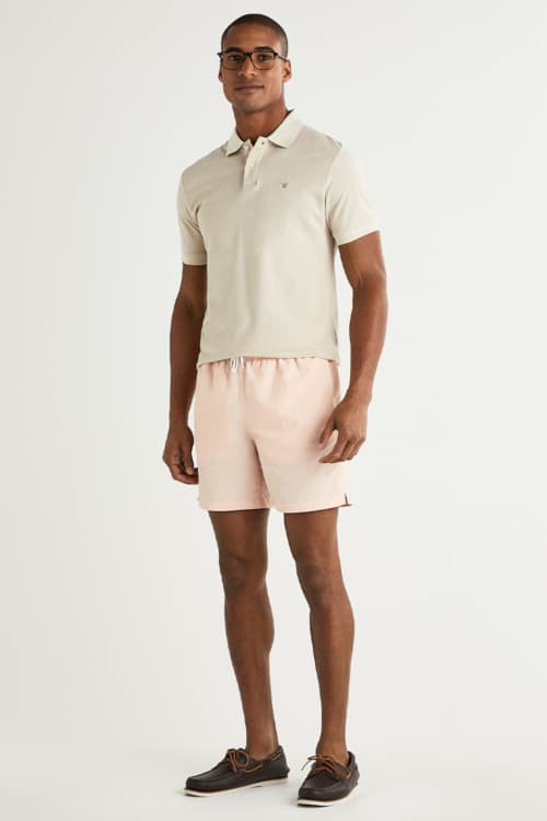 Men's polo shirt, swim shorts and deck shoes summer outfit