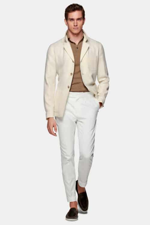 Men's white trousers, polo shirt and unstructured blazer outfit