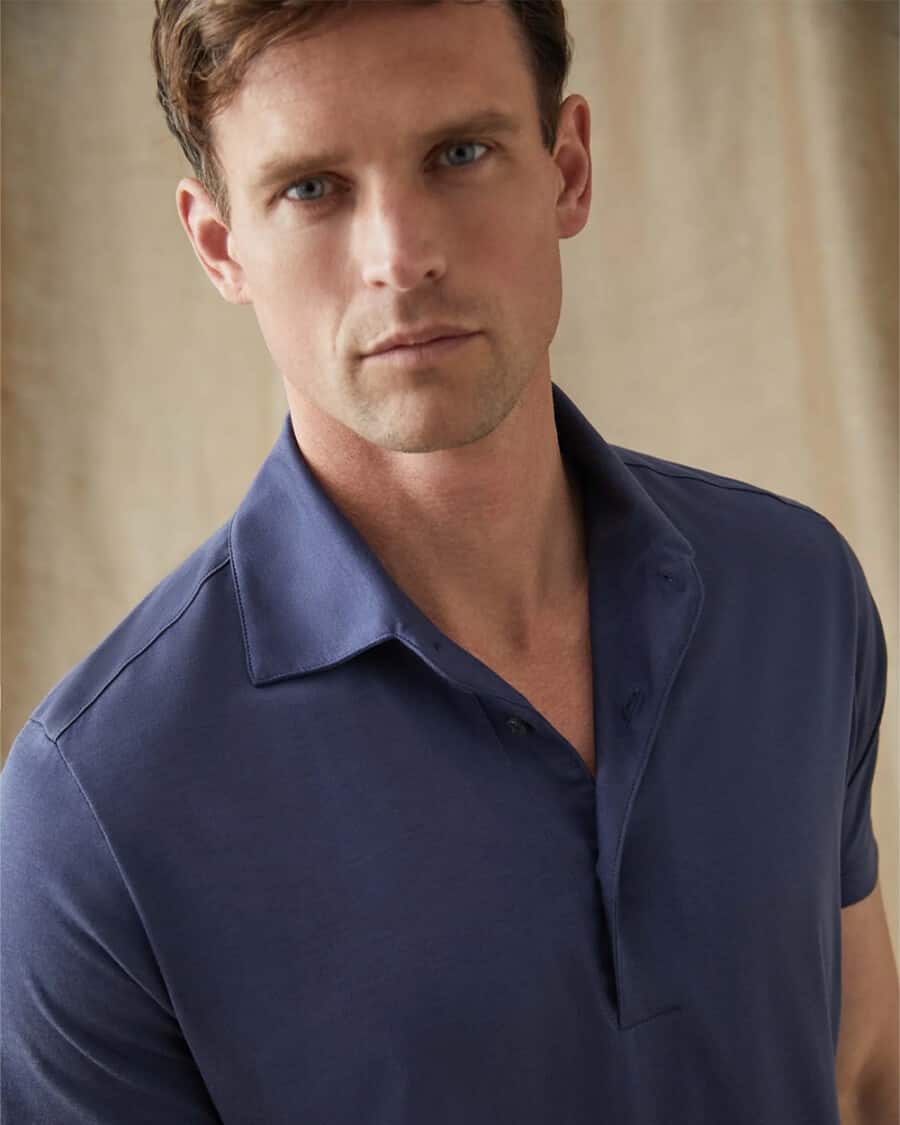 Man wearing a silk-cotton blue polo shirt