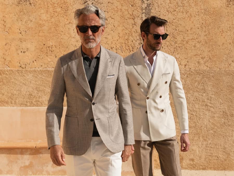 Two men wearing smart casual blazer and trouser combinations