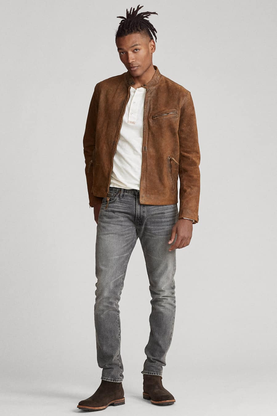 Men's grey jeans with brown suede boots, jacket and white Henley shirt outfit