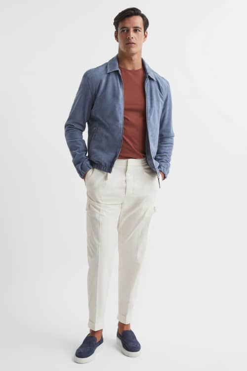Men's white pleated trousers, top and harrington jacket outfit