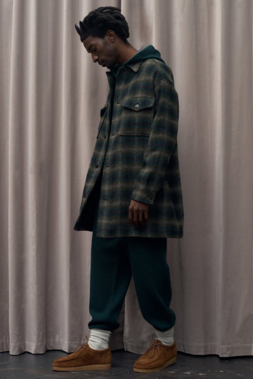 Men's joggers, hoodie, checked overcoat and wallabee shoes outfit