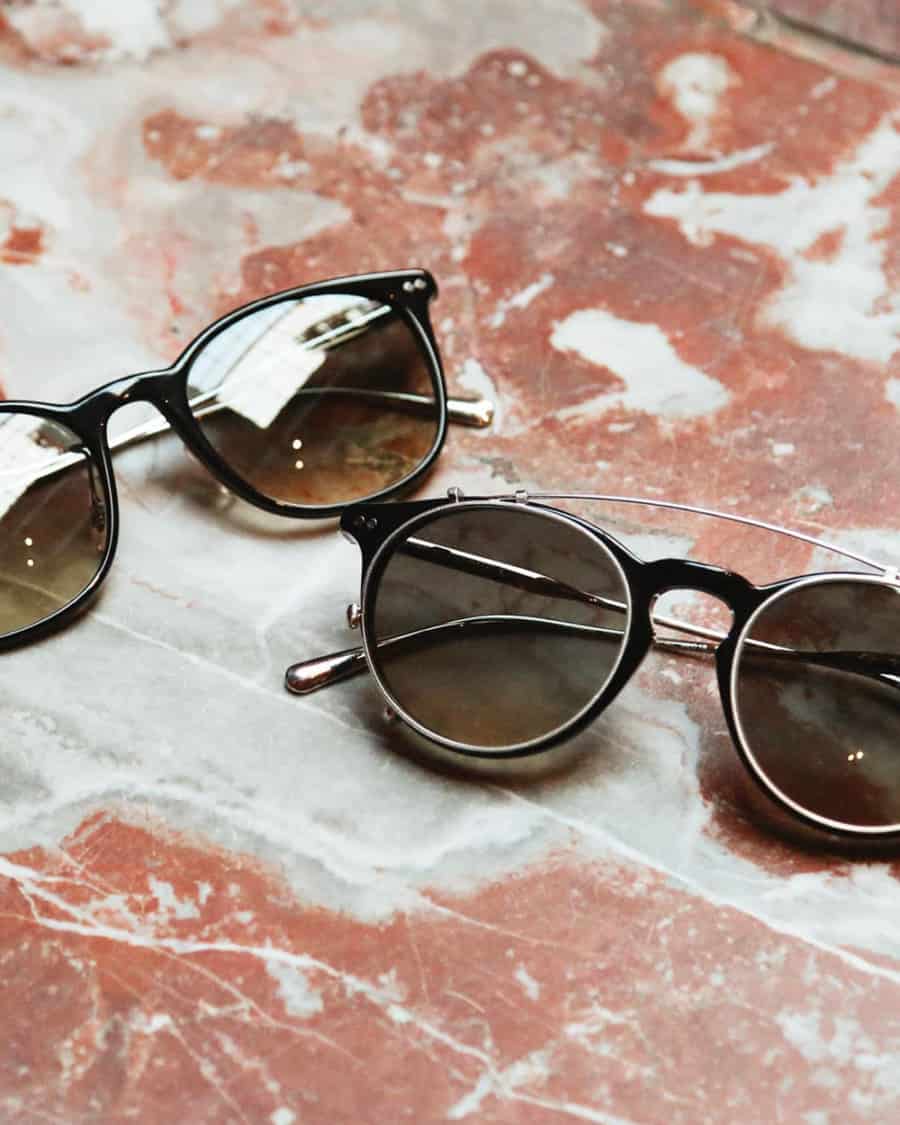 Oliver Peoples luxury sunglasses on a table