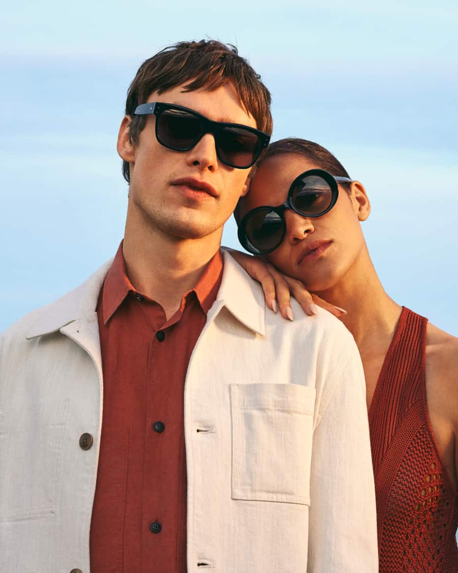 Man and woman wearing luxury Oliver Goldsmith sunglasses