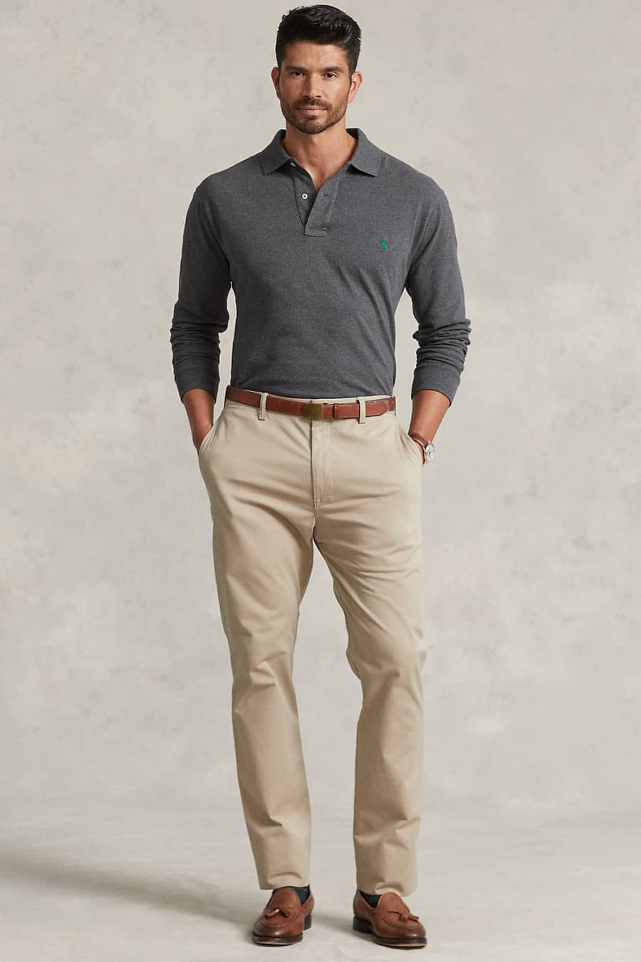 Men's khaki pants, long sleeve knitted grey polo shirt and brown loafers outfit