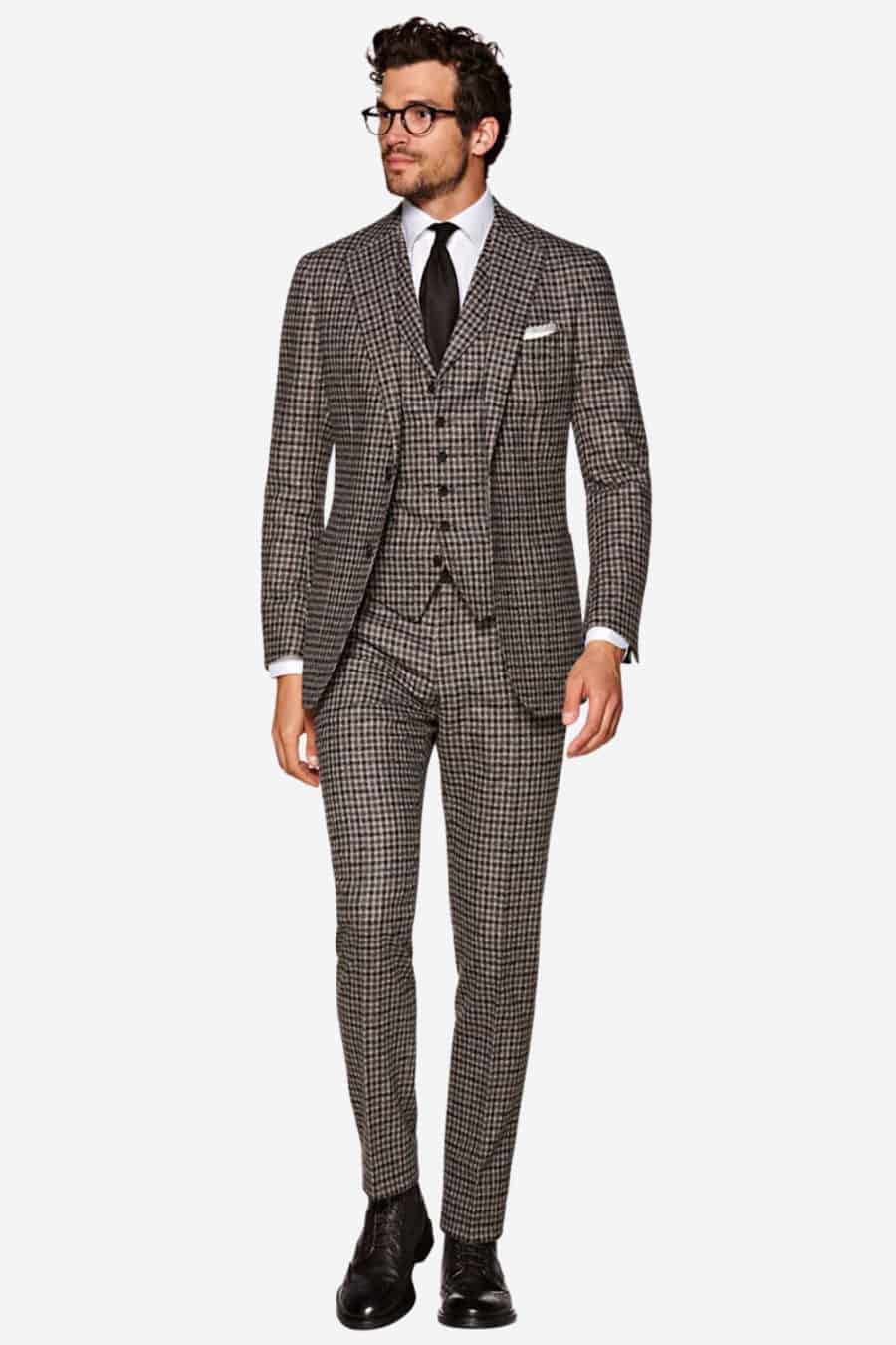 Men's tweed three-piece suit, white shirt and brown leather Derby boots outfit