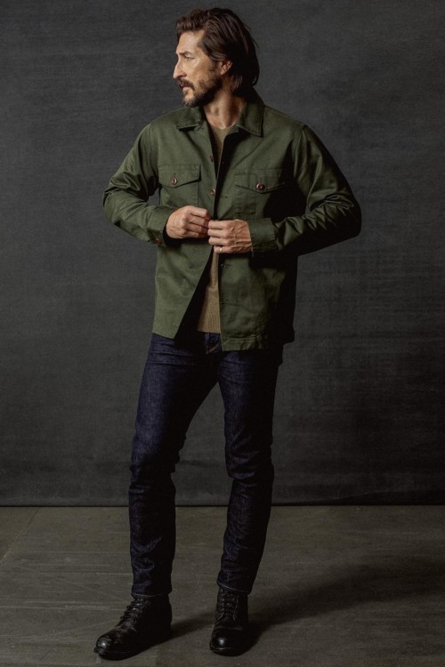 Men's tapered jeans, boots and green overshirt outfit