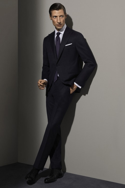 Men's smart navy lounge suit with white shirt and black Oxford shoes outfit
