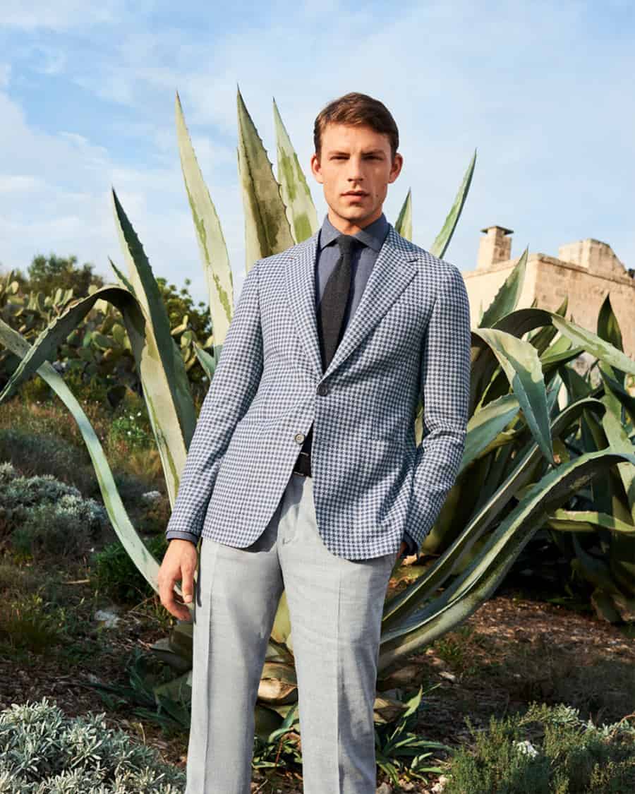 Men's checked blazer and plain trousers suit separates outfit
