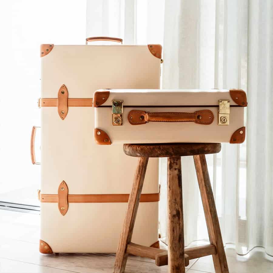 Two classic beige and tan leather luxury Globe-Trotter trunks