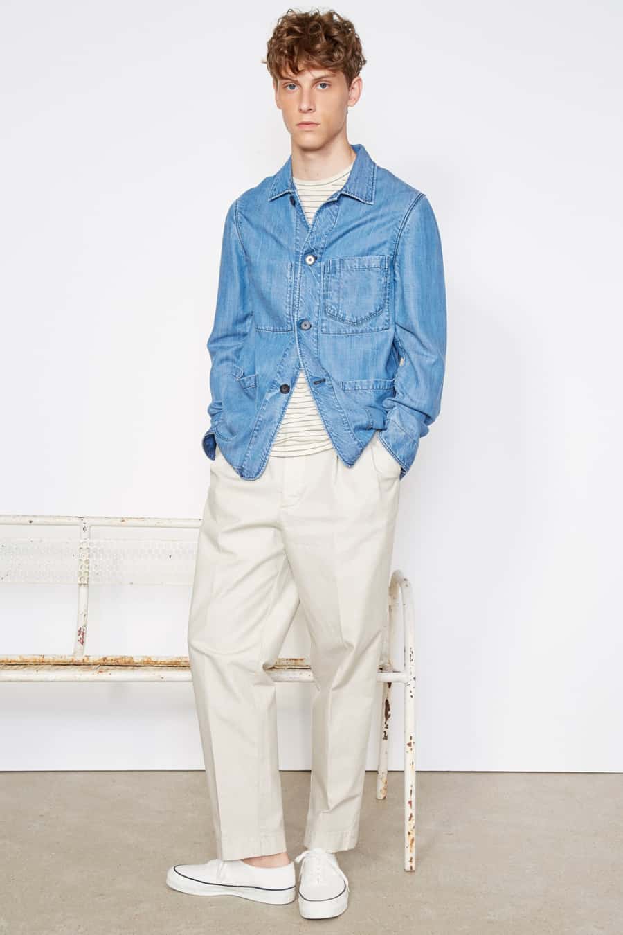 Men's mid blue denim work shirt, off-white trousers and white sneakers outfit