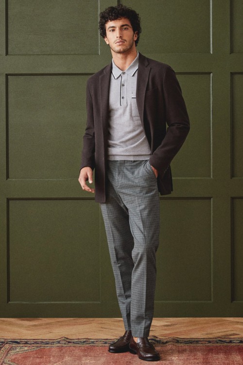 Men's wool trousers, knitted polo shirt, navy unstructured blazer and brown leather loafers outfit