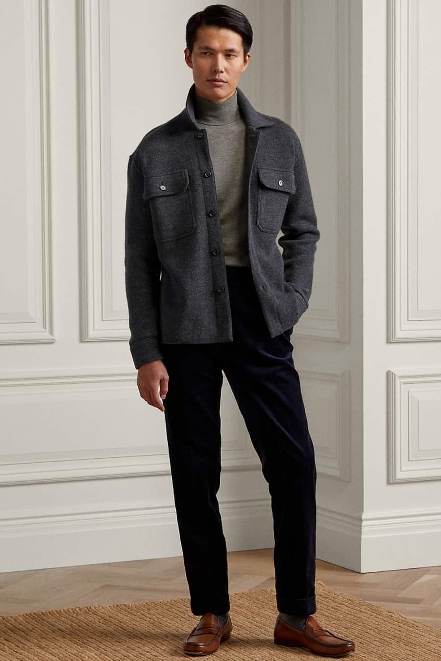 Men's navy corduroy trousers, grey turtleneck, charcoal flannel shirt and tan loafers outfit
