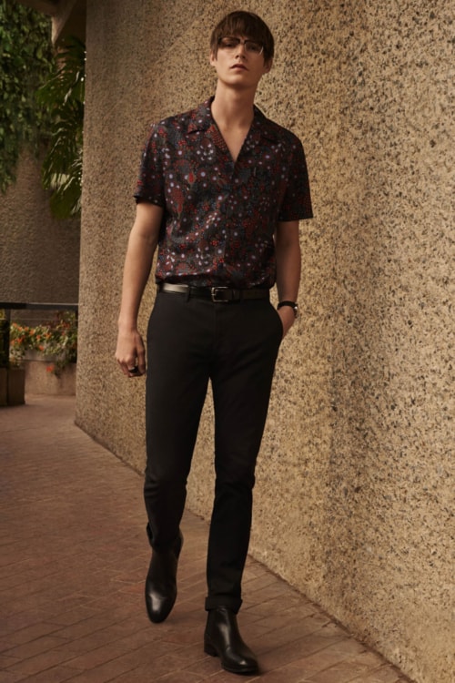 Men's black chinos, patterned shirt, black Chelsea boots nightclub outfit