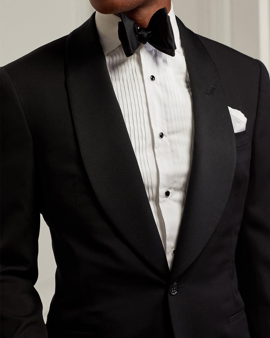 A traditional white black tie marcella shirt with bib worn with black bow tie and dinner jacket