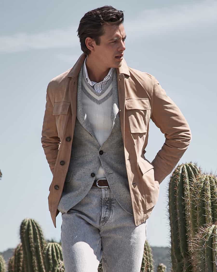 Men's grey jeans, grey unstrucutred blazer, camel field jacket outfit