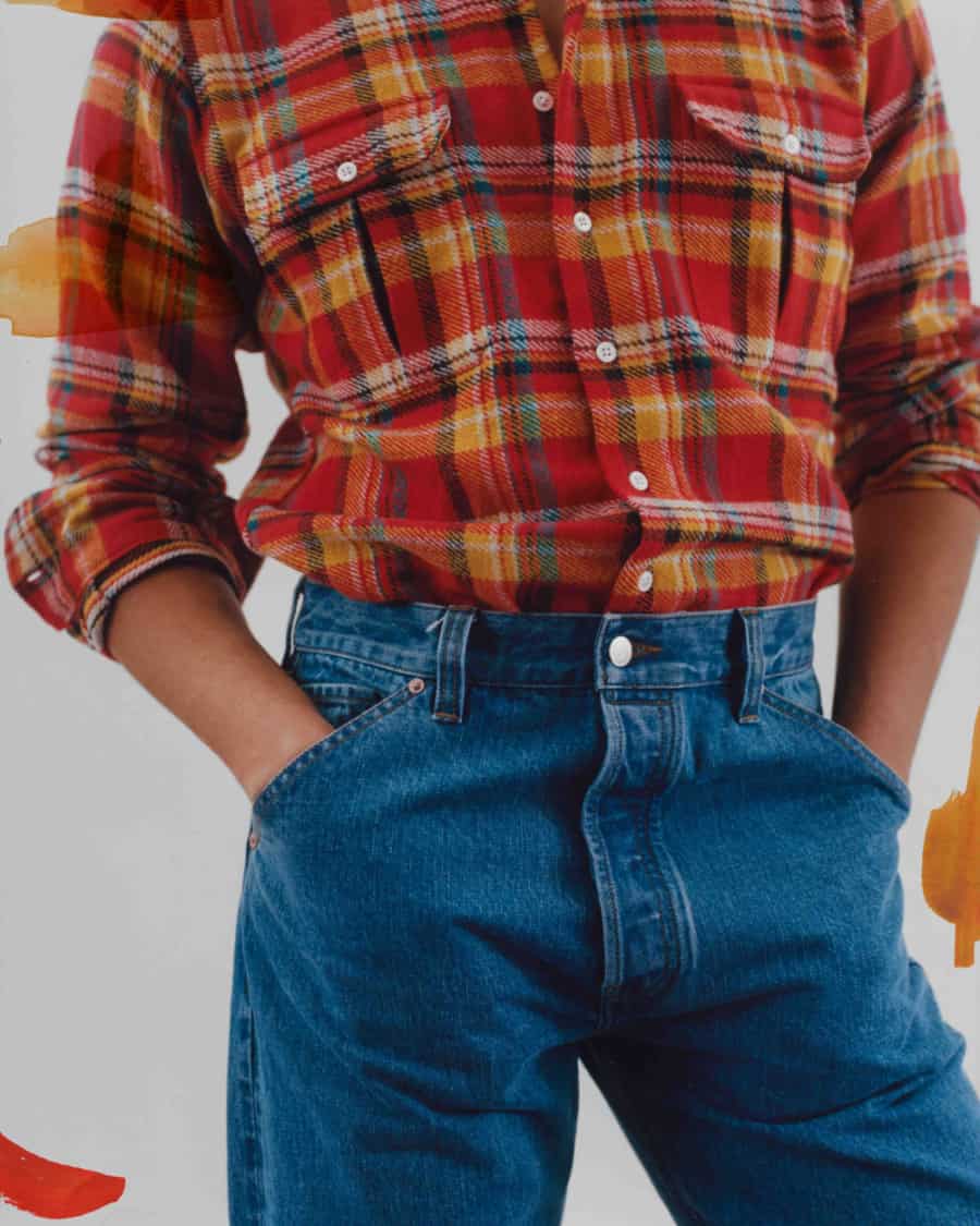 Drake's red flannel shirt tucked into jeans