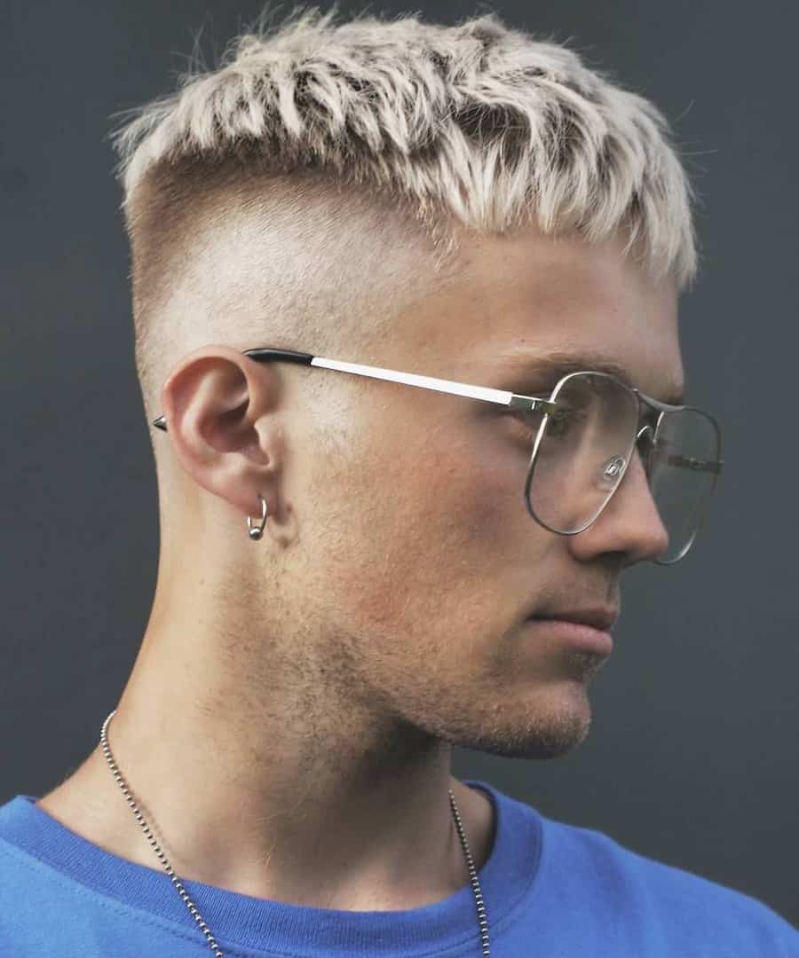 Men's modern blonde highlights hairstyle
