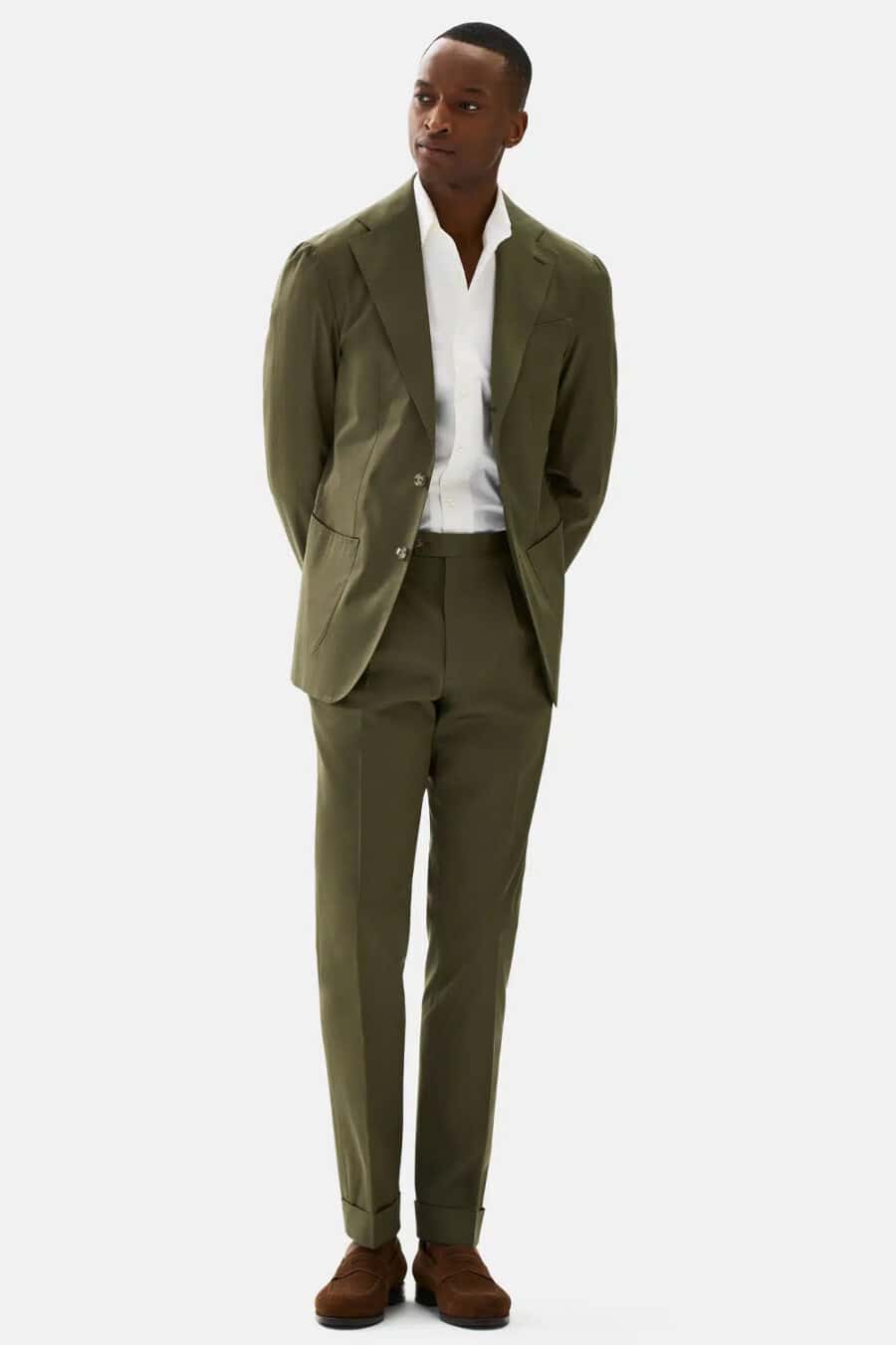 Men's green cotton suit, white shirt and tan brown suede penny loafers business casual outfit