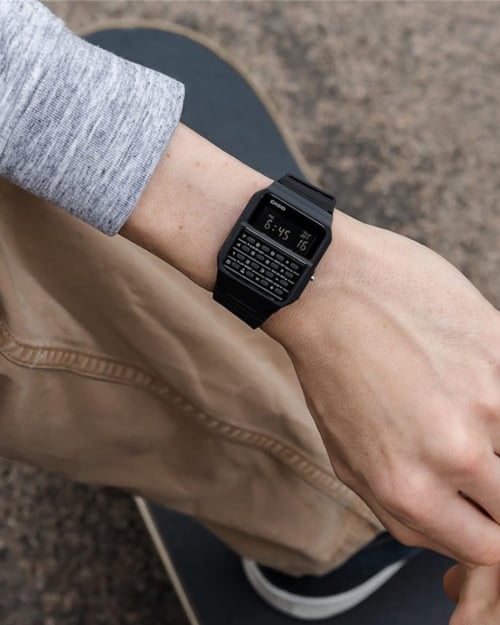 Men's Casio calculator watch on wrist
