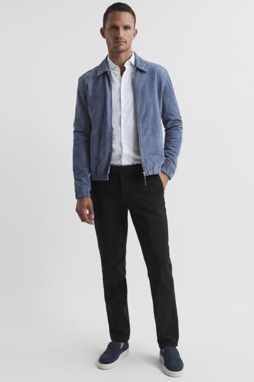 Men's black hinos, white shirt, light blue blouson jacket and slip on suede sneakers outfit