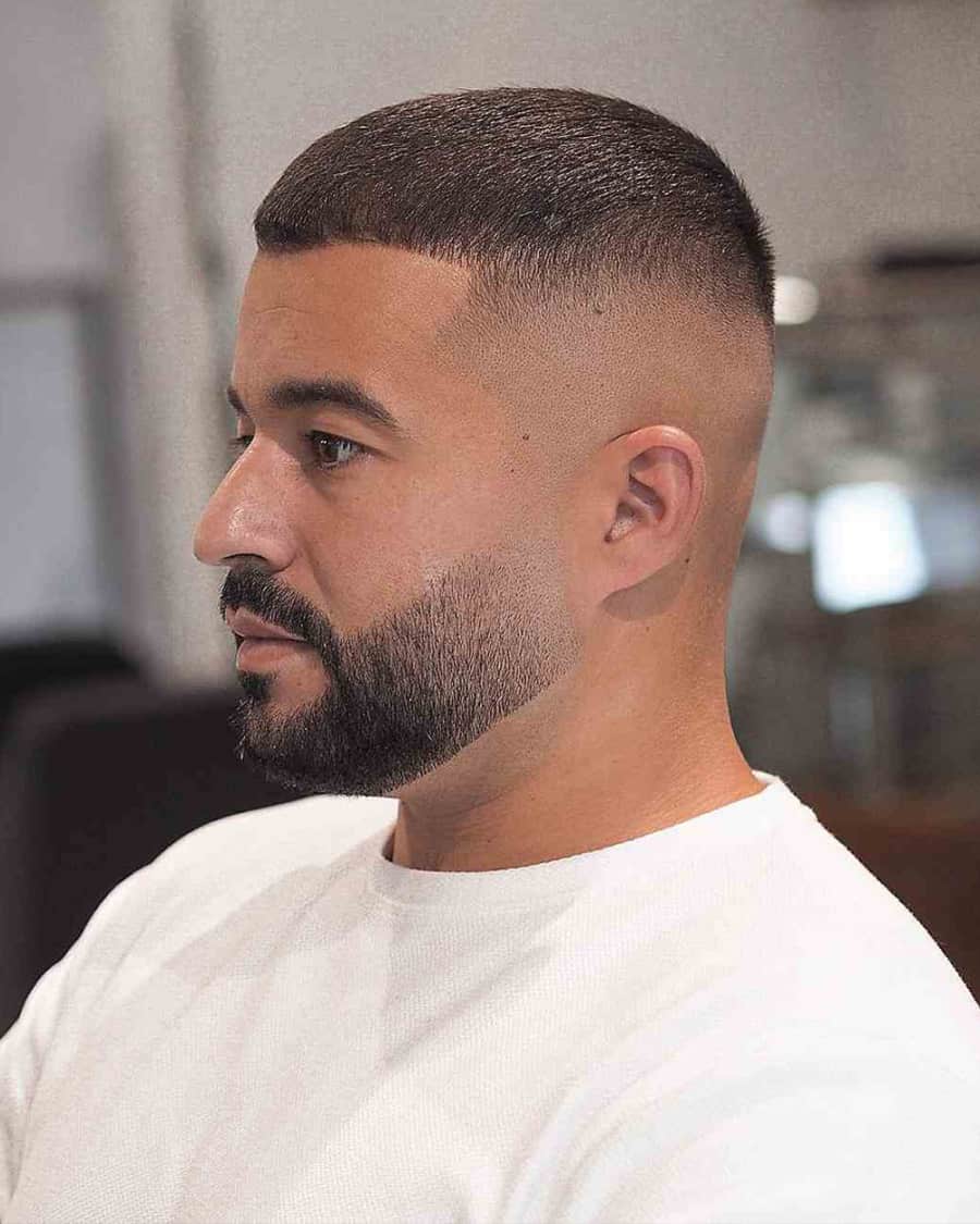 Man with a fresh buzz cut fade haircut
